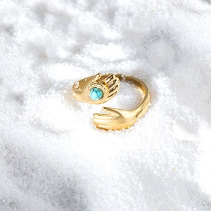 Adjustable golden hug ring in stainless steel with a turquoise stone palm design