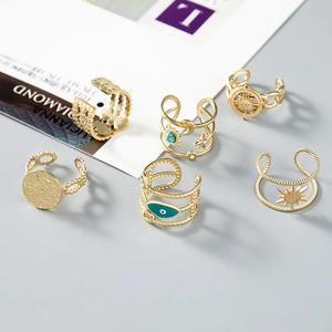 6-piece gold bohemian ring set with sun, moon, and turquoise stone in vintage style
