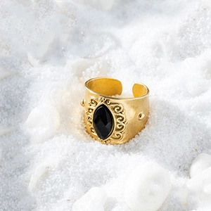 Vintage gold and black marquise stone open ring with carved relief scroll patterns