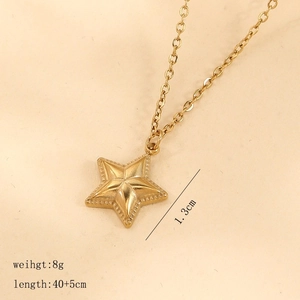 Detail view of gold star pendant necklace with dimensions 1.3cm and 40+5cm length chain
