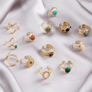 Vintage gold-plated adjustable stainless steel rings with turquoise inlay on silk