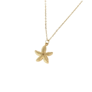 Minimalist gold starfish pendant necklace with detailed texture on a fine chain