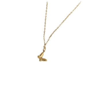 Polished gold butterfly pendant necklace made of stainless steel on white background