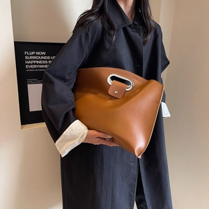 Minimalist brown leather large tote bag with metal cutout handle for women office commute