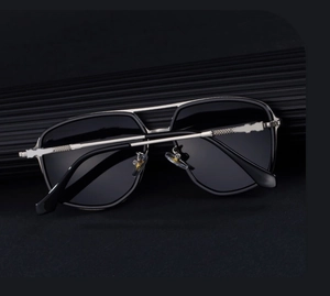 Detail of silver metal bridge and engraved temples on square aviator sunglasses