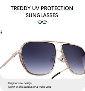 Detail of gold metal double bridge aviator sunglasses with gradient blue lenses
