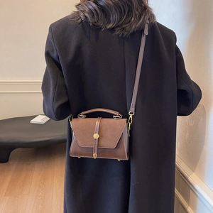Brown vintage faux suede and leather crossbody bag with gold button for women