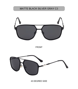 Detail of matte black square sunglasses with metallic double bridge and gray lenses