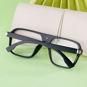 Detail of square black polarized sunglasses with a premium cream leather folding case