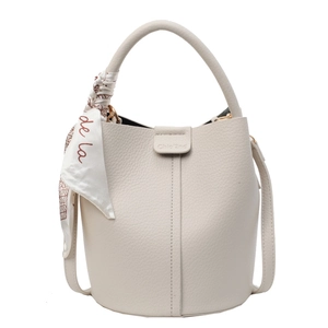 Elegant off-white lychee texture bucket bag with chic silk scarf on top handle