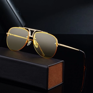 Modern double bridge aviator sunglasses with yellow lenses and gold metal frame