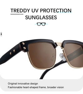 Detailed view of polarized brown lenses with black and gold frame and metallic rivets