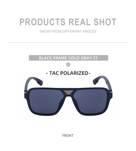 Macro view of black square frame sunglasses with gold textured metal bridge and TAC lenses