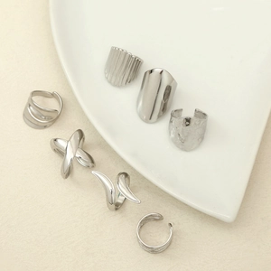 7-piece set of silver stainless steel rings with irregular textures and minimalist designs