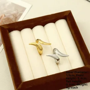 Detail showing dimensions of gold and silver vertical stripe rings with size labels