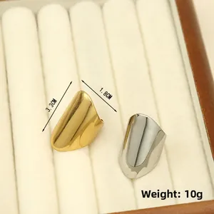 Detailed view of irregular geometric ring with 3.3cm height and 1.8cm width dimensions