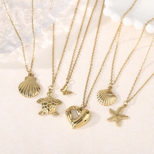 Golden stainless steel ocean series necklaces with starfish and seashell charms set