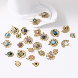 Macro view of geometric gold-plated DIY pendants with colorful natural stones for necklaces