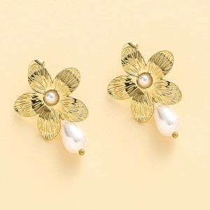French palace style gold flower earrings with white pearls and brushed metal texture