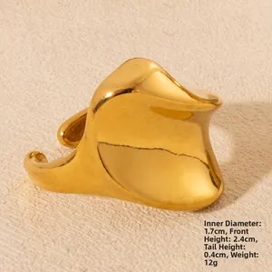 Polished gold wavy ring detail showing inner diameter 1.7cm and front height 2.4cm
