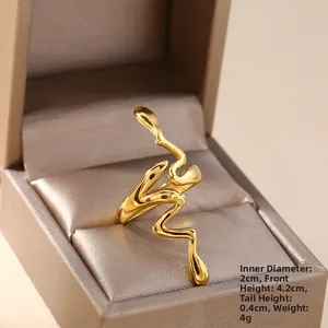 Detail view of 18k gold plated fluid wave ring with size measurements in box