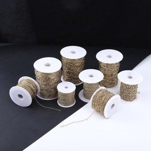 8 rolls of 18k gold plated stainless steel DIY jewelry chains on white spools