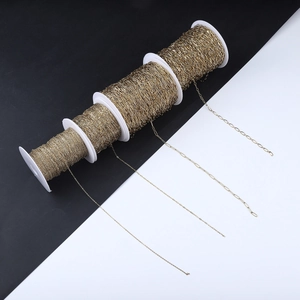 Set of four 18k gold plated stainless steel jewelry chains on spools in various sizes