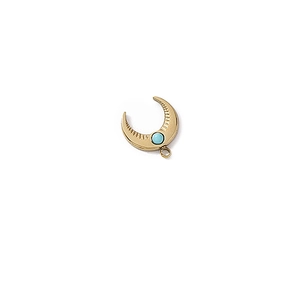Detailed close-up of golden crescent moon pendant with turquoise stone and radial texture