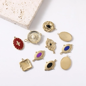 Eight-pointed star vintage pendants set in gold plating with colorful enamel details