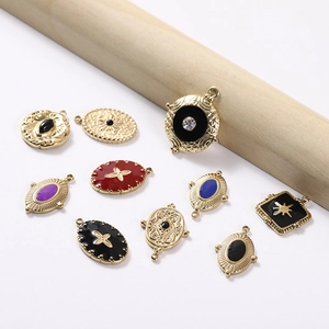 Eight-pointed star ripple pendants in gold finish with colorful enamel and rhinestone