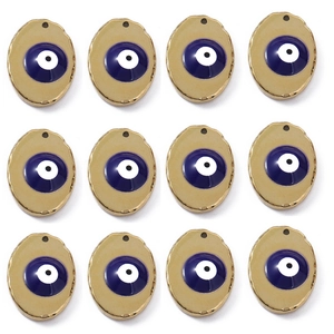 Set of 12 gold-plated evil eye pendants with blue enamel detail for DIY jewelry making