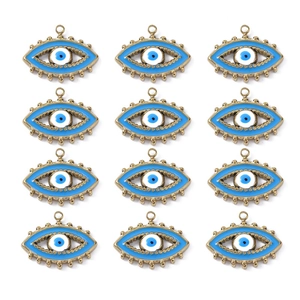 Detailed macro view of twelve golden evil eye enamel charms for DIY jewelry making