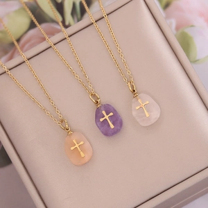 Minimalist natural stone cross necklace with gold chain and irregular stone pendants