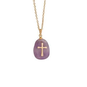 Detailed close-up of a purple natural stone pendant with gold cross on a chain