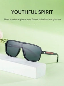 Détail de lunettes de soleil carrées polarisées avec monture monobloc et accents rouges