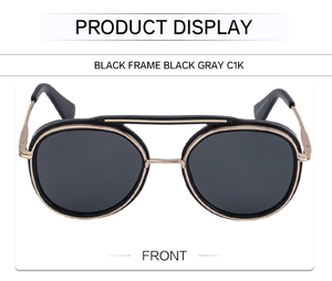 Front view of retro punk sunglasses with black and gold round frames and dark grey lenses