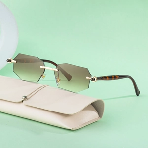 2025 frameless geometric sunglasses with gold metal frame and cream leather case