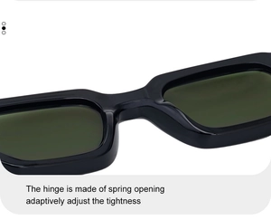 Detail of square sunglasses with flexible spring hinges and dark green lenses
