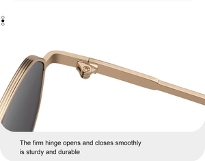 Macro detail of sturdy golden metal hinge with smooth opening for square sunglasses