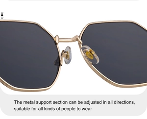 Detail of golden metal bridge and adjustable nose pads on square frame sunglasses