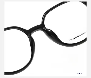 Macro detail of the integrated nose pads on black square optical eyeglass frames