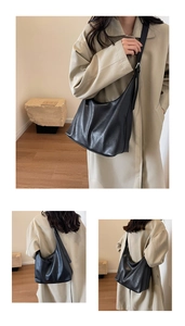 Detailed view of black large-capacity leather Hobo bag with adjustable shoulder strap