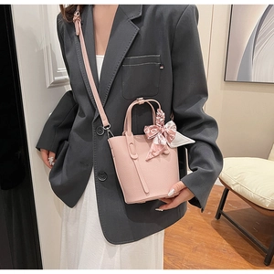 Pink lychee grain leather mini bucket bag with heart pattern scarf wrapped on handles