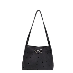 Minimalist black canvas bucket bag with star prints and silver bow metal detail