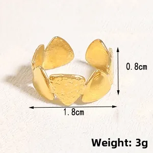 Detailed view of adjustable gold-tone textured ring with dimensions 1.8cm diameter