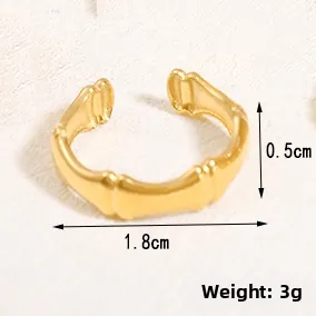Detailed view of golden bamboo-style open ring with width and weight measurements
