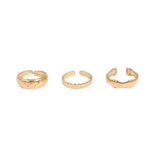 Three-piece gold adjustable ring set featuring star patterns, beads, and bamboo design