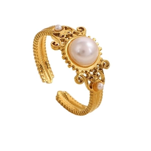 Bague vintage dorée avec perle, gravures florales ajourées et anneau ouvert ajustable
