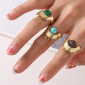 Bohemian gold sunburst rings with green, blue, and purple natural stone inlays