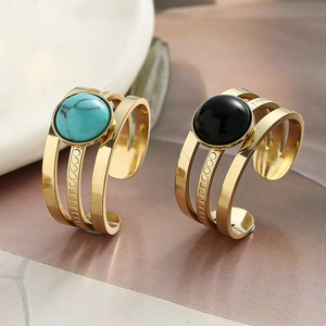 Three-layer gold open ring set with natural turquoise and black round stone accents